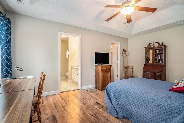 287 Jeremy Dr, Colbert, GA 30628 - bedroom with light wood-type flooring, connected bathroom, baseboards, and ceiling fan