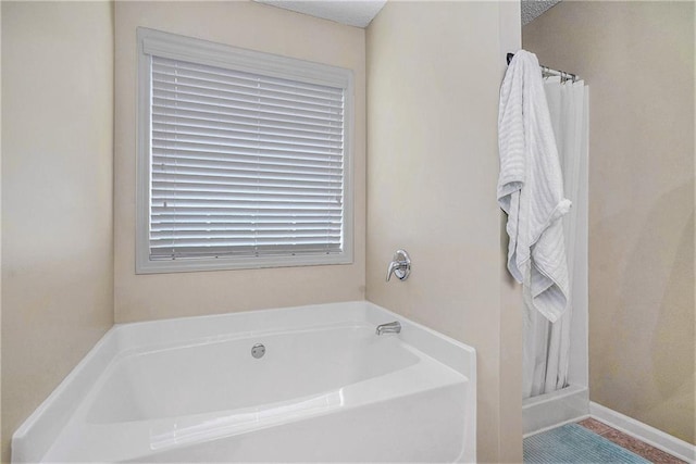 287 Jeremy Dr, Colbert, GA 30628 - full bathroom with a garden tub and a shower with shower curtain