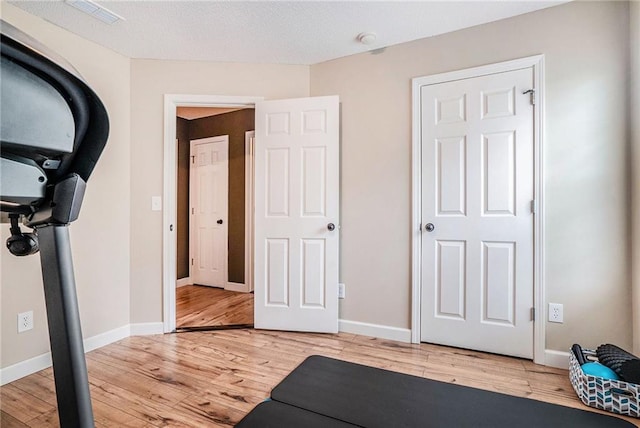 287 Jeremy Dr, Colbert, GA 30628 - exercise room featuring light wood-style flooring and baseboards