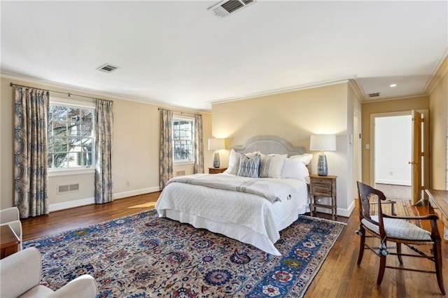 bedroom featuring dark hardwood / wood-style floors and ornamental molding