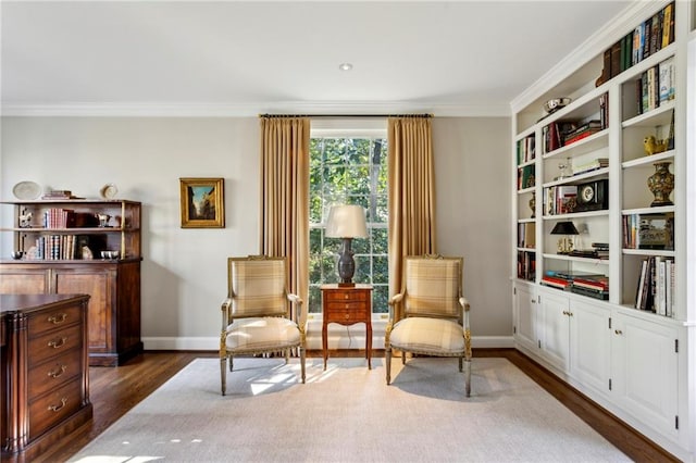 living area with crown molding and dark wood-type flooring