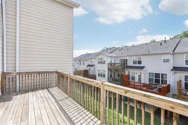 wooden deck with a residential view
