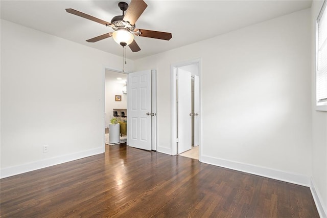 1437 Vesta Ave, East Point, GA 30344 - unfurnished bedroom with baseboards, wood finished floors, and ceiling fan
