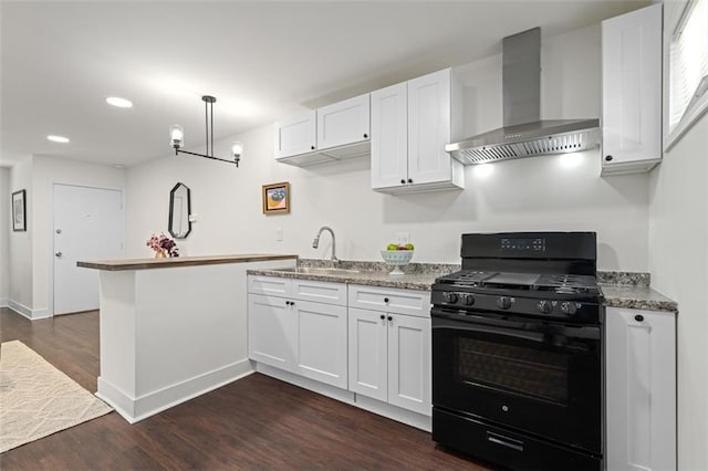 1437 Vesta Ave, East Point, GA 30344 - kitchen featuring black range with gas stovetop, wall chimney exhaust hood, a sink, dark wood-style floors, and white cabinets