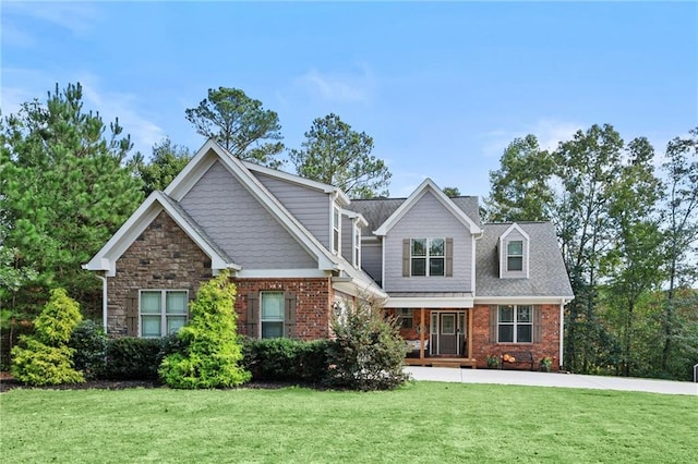 craftsman-style home with a front yard