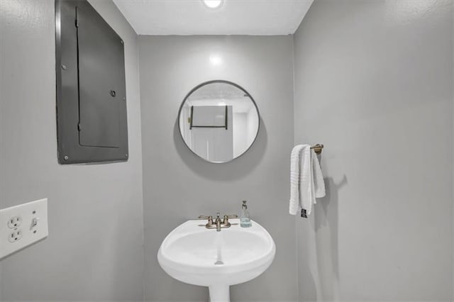 bathroom featuring sink and electric panel