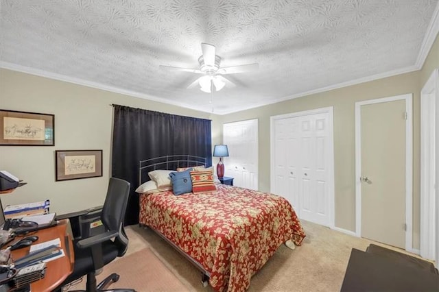 bedroom with crown molding, ceiling fan, light carpet, and a textured ceiling