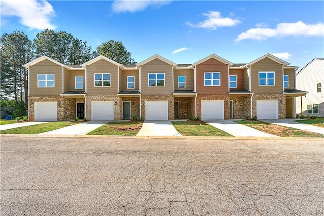 3607 Brycewood Dr, Decatur, GA 30034 - townhome / multi-family property with an attached garage, driveway, and brick siding