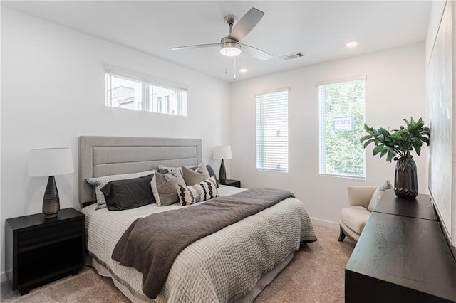 carpeted bedroom featuring ceiling fan