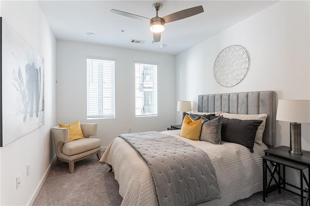 bedroom with ceiling fan and carpet flooring