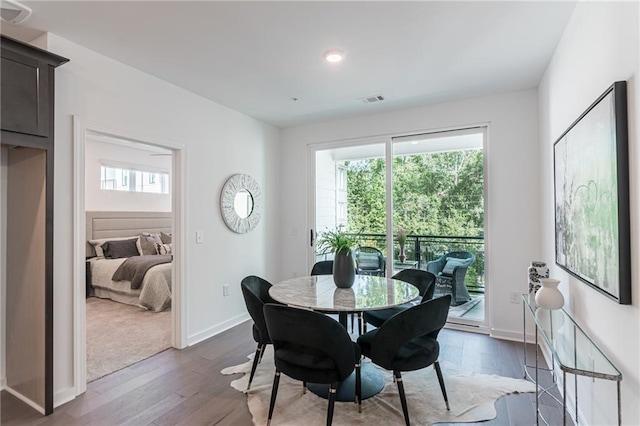 dining room featuring dark wood-type flooring