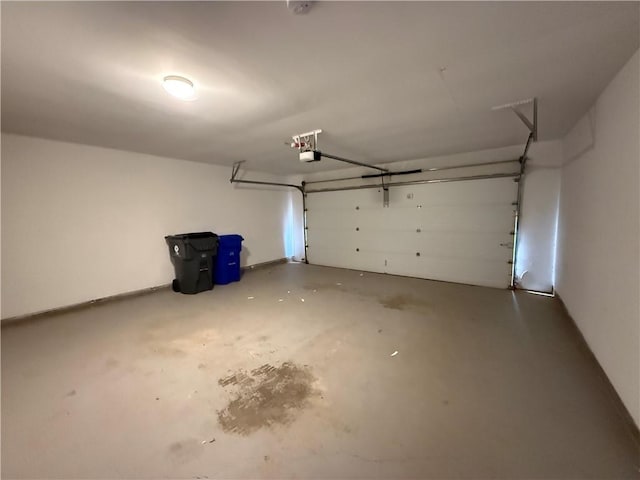 garage featuring a garage door opener