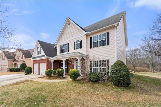 view of front of house featuring driveway, a garage, a front yard, a porch, and brick siding