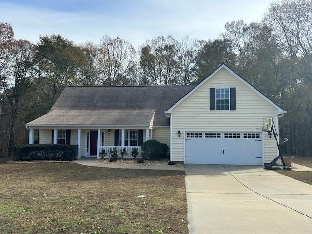 view of front of house with covered porch and a front lawn