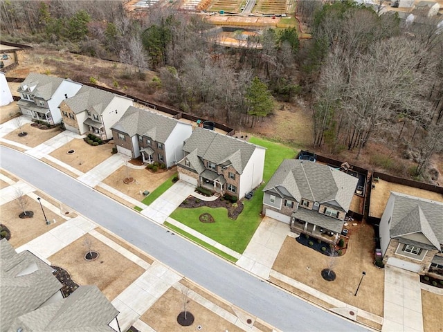 birds eye view of property with a residential view