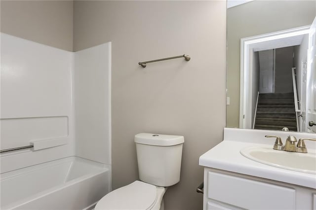 full bathroom featuring vanity, toilet, and shower / washtub combination