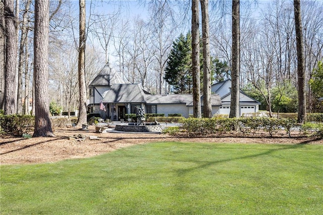 view of yard featuring a garage