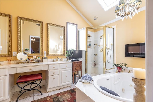 bathroom featuring lofted ceiling with skylight, tile patterned flooring, a shower stall, and a tub with jets