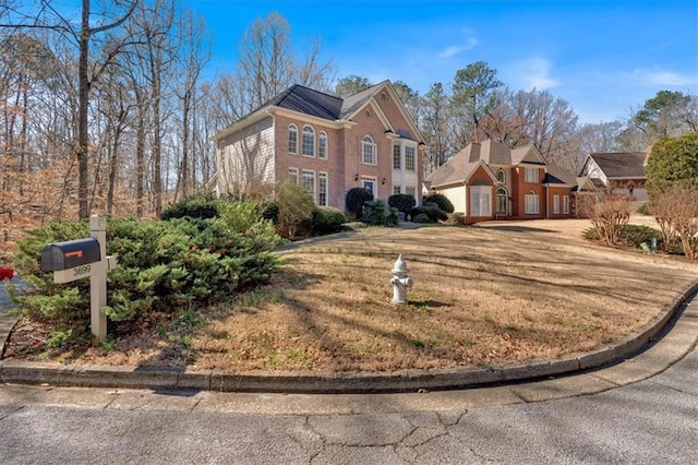 view of front of home with a front lawn