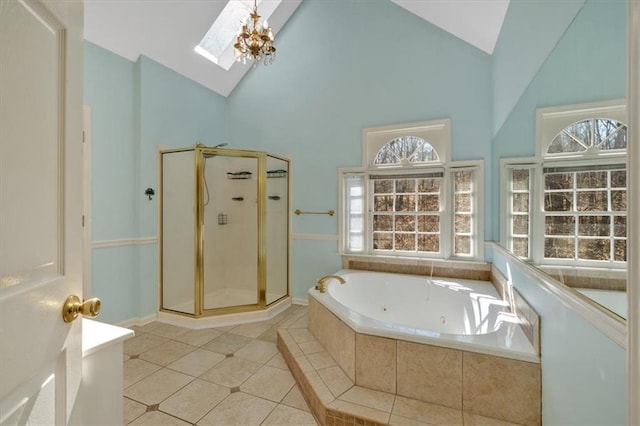 full bathroom featuring high vaulted ceiling, a stall shower, a tub with jets, a skylight, and tile patterned flooring