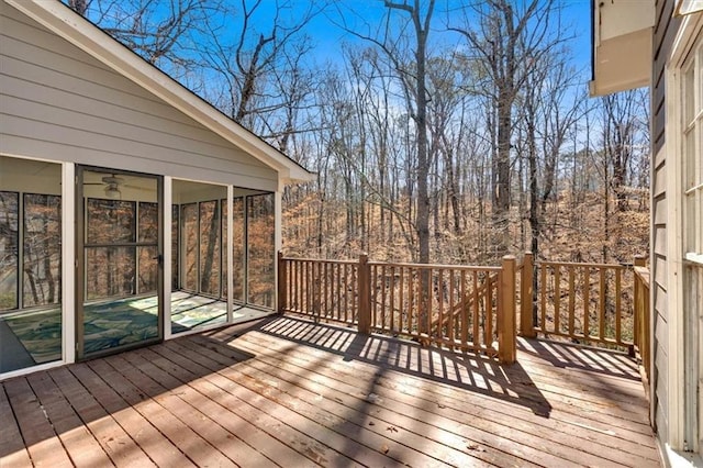 wooden terrace with a sunroom