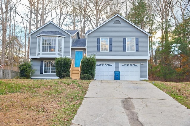 split foyer home featuring a garage