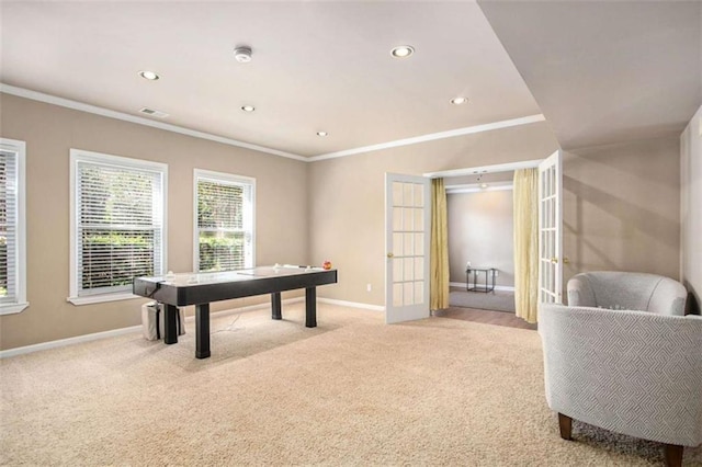 playroom with ornamental molding, light carpet, and french doors