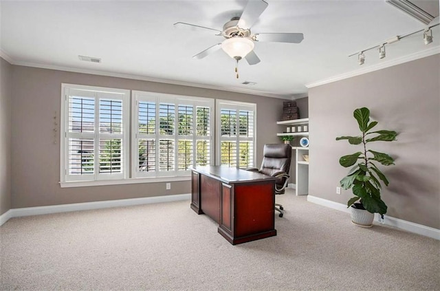 office with light colored carpet, track lighting, ceiling fan, and crown molding