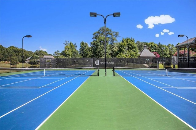 view of tennis court with basketball court