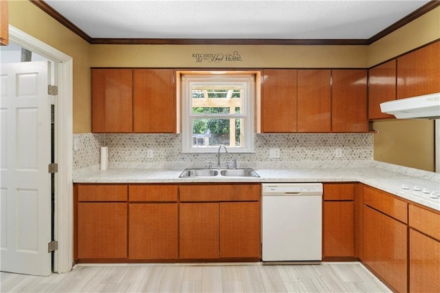 342 Spring Valley Rd, Waynesboro, GA 30830 - kitchen featuring white appliances, a sink, ornamental molding, light countertops, and brown cabinetry