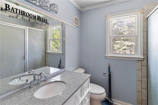 342 Spring Valley Rd, Waynesboro, GA 30830 - full bath with a shower stall, crown molding, toilet, vanity, and baseboards