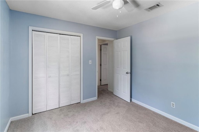 342 Spring Valley Rd, Waynesboro, GA 30830 - unfurnished bedroom with carpet flooring, baseboards, a closet, and a ceiling fan