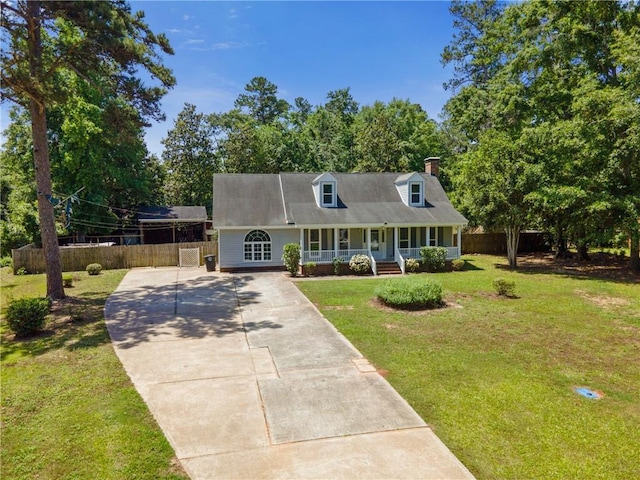 342 Spring Valley Rd, Waynesboro, GA 30830 - cape cod-style house with driveway, covered porch, and a chimney