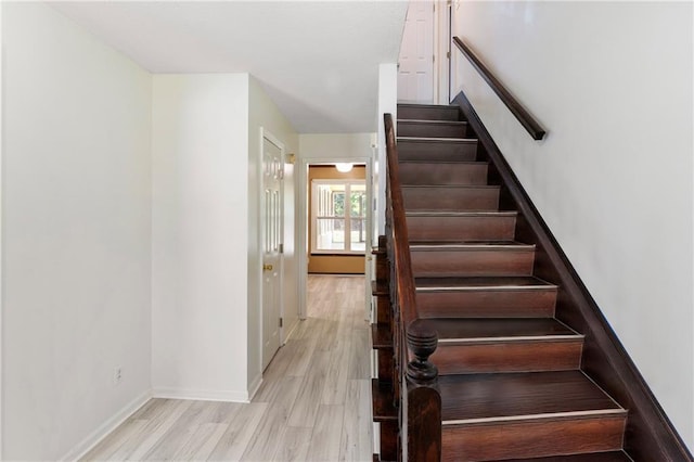 342 Spring Valley Rd, Waynesboro, GA 30830 - stairs featuring wood finished floors and baseboards