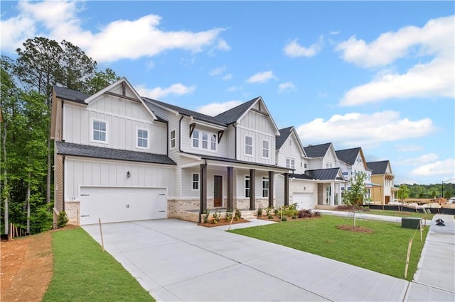 729 Keystone Dr, Woodstock, GA 30188 - modern farmhouse featuring board and batten siding, driveway, a porch, and a residential view