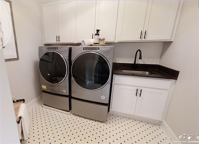 729 Keystone Dr, Woodstock, GA 30188 - laundry room with cabinet space, independent washer and dryer, and baseboards