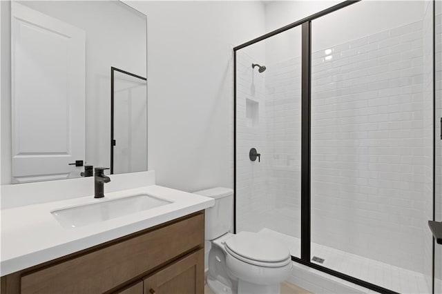 729 Keystone Dr, Woodstock, GA 30188 - bathroom featuring a stall shower, toilet, and vanity
