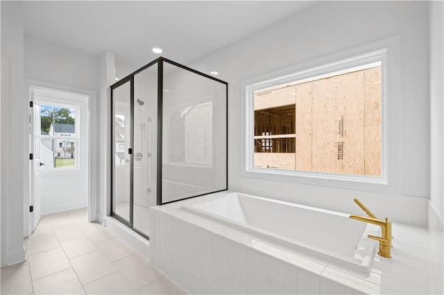 729 Keystone Dr, Woodstock, GA 30188 - full bath with a shower stall, a garden tub, tile patterned floors, and recessed lighting