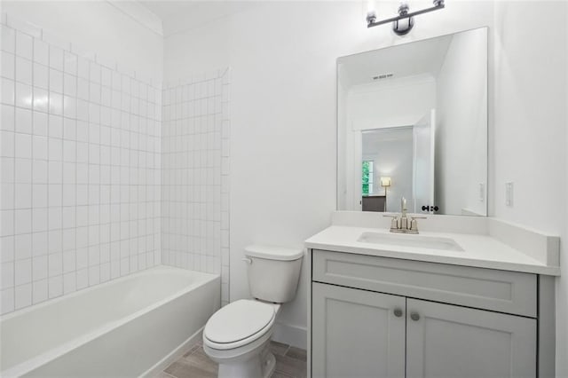 bathroom featuring shower / bath combination, visible vents, toilet, ornamental molding, and vanity