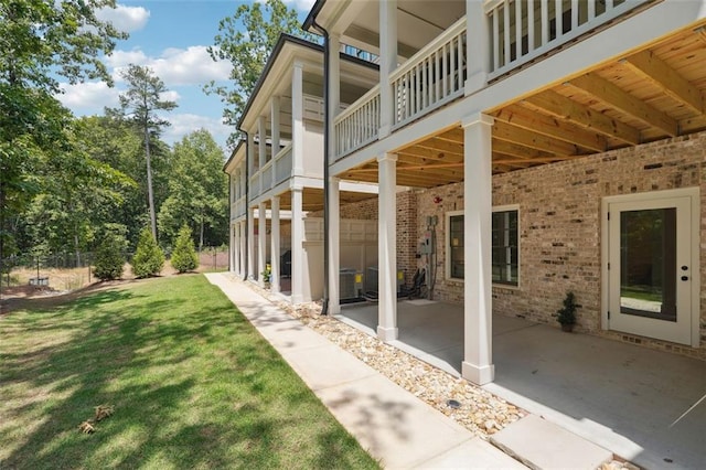 view of yard featuring a patio area and fence