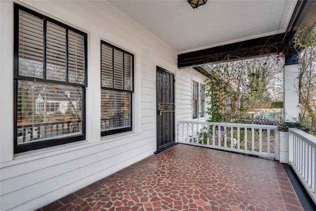 balcony featuring a porch