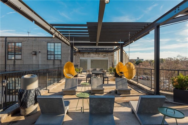 view of patio / terrace featuring fence, outdoor dining area, and a pergola