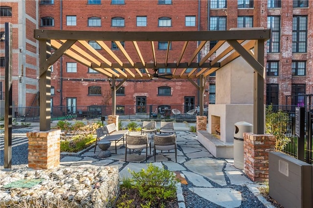 view of patio featuring fence and a pergola