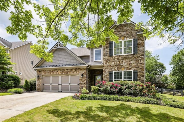 7712 Soaring Eagle Dr, Flowery Branch, GA 30542 - craftsman inspired home featuring a garage, fence, a front lawn, concrete driveway, and stone siding