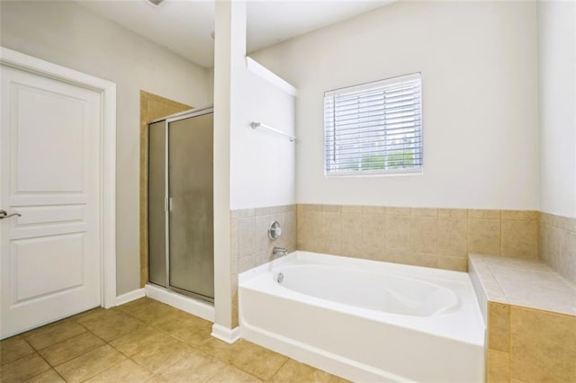 7712 Soaring Eagle Dr, Flowery Branch, GA 30542 - bathroom featuring a bath, a shower stall, and tile patterned flooring