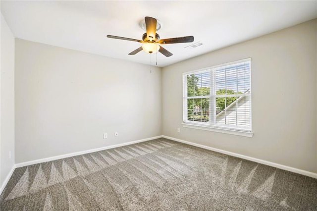 7712 Soaring Eagle Dr, Flowery Branch, GA 30542 - empty room featuring baseboards, carpet, a ceiling fan, and visible vents