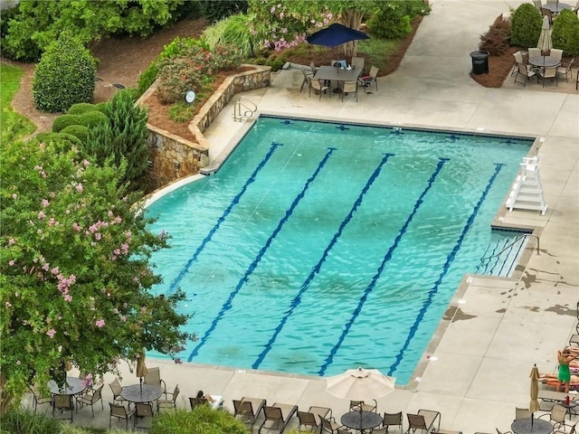 7712 Soaring Eagle Dr, Flowery Branch, GA 30542 - pool with outdoor dining area and a patio area