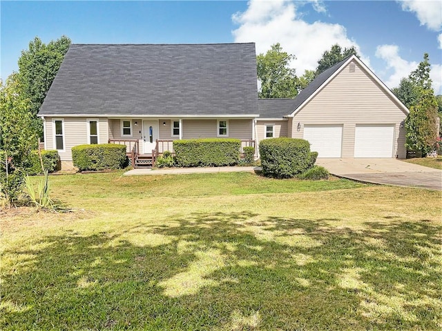 cape cod house with a garage and a front lawn