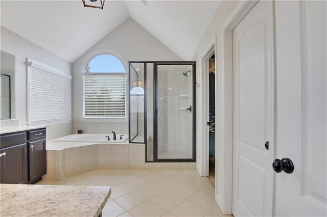 1803 Stone Bridge Way, Marietta, GA 30064 - bathroom with tile patterned flooring, a stall shower, and vaulted ceiling