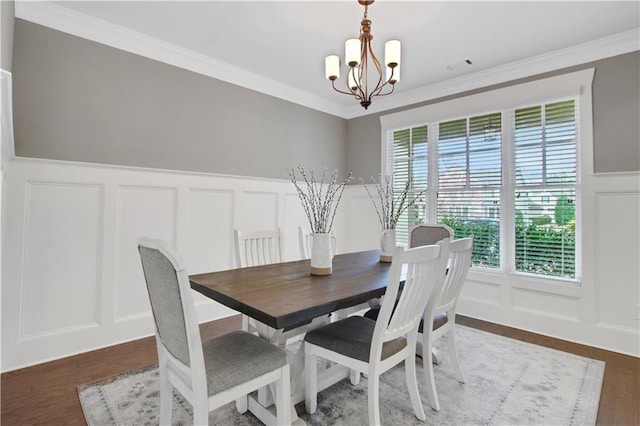 1803 Stone Bridge Way, Marietta, GA 30064 - dining area with visible vents, wood finished floors, an inviting chandelier, crown molding, and a decorative wall
